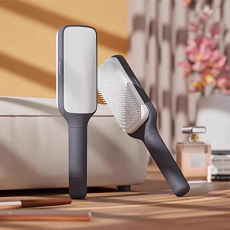 Self-cleaning hairbrush